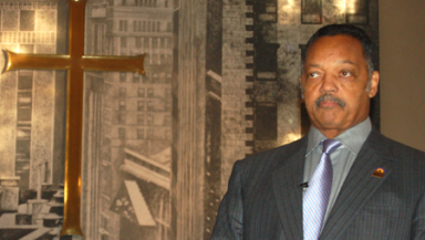 The Rev Jesse Jackson pauses during an address to black activists, ...