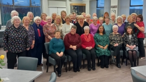 Church-run shop volunteers receive prestigious award for decades of service