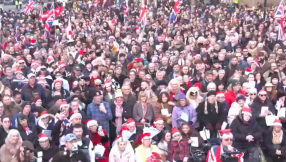 Large crowds join Tommy Robinson's Christmas carol service