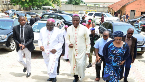 Bishop Jude Arogundade entering the St Francis Xavier Church shortly after the massacre in 2022