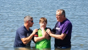 Twenty churches unite as 80 people are baptised in public celebration