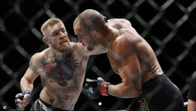 Conor McGregor news updates: history is made as he becomes first man to hold two UFC championship titles