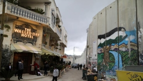 Welcome To The Wall: Artist Banksy Opens \'Walled Off\' Bethlehem Hotel 