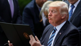 Trump signs order to ease ban on political activity by churches