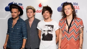 One Direction\'s Louis Tomlinson denies Harry Styles romance rumors