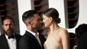 Behati Prinsloo news: Adam Levine's wife flaunts growing baby bump