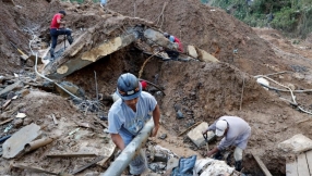 Hopes fade for dozens buried in chapel during landslide