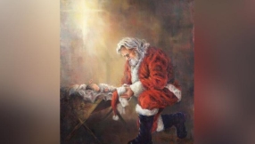 Facebook blocks festive image of Santa Claus kneeling before baby Jesus