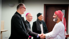 Christians and Muslims stand together to remember victims of New Zealand mosque shootings