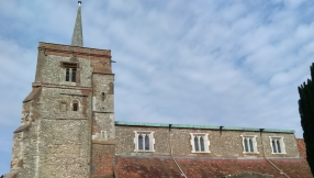 Heartbroken villagers hold vigil for murdered church volunteer 