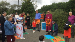 Christian activists arrested at international arms fair