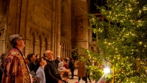 Syrian child refugee turns on lights of Durham Cathedral's 25ft Christmas tree