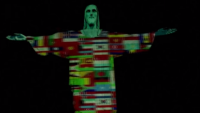 Christ the Redeemer lit up with flags of countries affected by coronavirus pandemic