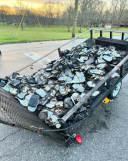Large pile of burnt Bibles left outside church on Easter Sunday
