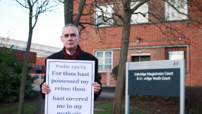 Preacher fined over Bible verse display challenges abortion clinic buffer zones