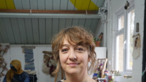 Christian artist removed from her own exhibition over transgender remarks settles with council