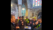 Apology issued after anti-immigration protesters confront clergyman inside church