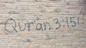 Churches vandalized by graffiti artists with verses from Quran