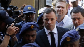 Oscar Pistorius arrives in court for sentencing