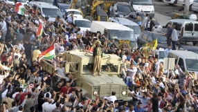 Kurdish convoy heads to Syria to take on Islamic State