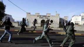 Up to five dead in suspected Palestinian attack on Jerusalem synagogue