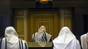 Knife attack synagogue reopens, but Jerusalem is still tense