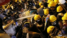 Hong Kong protesters clash with police forcing closure of government HQ