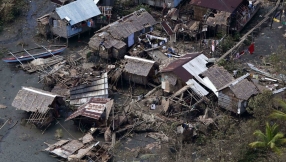 Rescue workers struggle in aftermath of Typhoon Hagupit