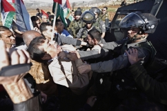 Israelis and Palestinians clash over autopsy report on minister