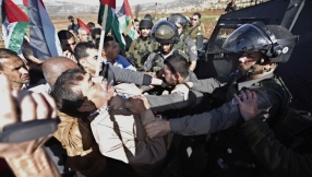 Israelis and Palestinians clash over autopsy report on minister