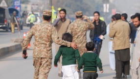 Peshawar: More than 120 dead in Taliban attack on Pakistani high school