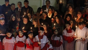 Baghdad\'s Christians gather defiantly for Christmas Eve mass