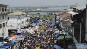 Liberia relaxes Ebola rules for New Year\'s Eve services as aid workers warn of complacency 