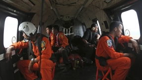Missing AirAsia Flight QZ8501: divers resume search for wreckage