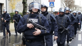 French forces kill newspaper attack suspects, hostages die in second siege