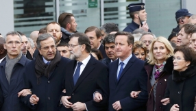 World leaders join hundreds of thousands in Paris solidarity march