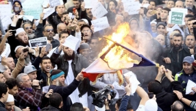 Charlie Hebdo\'s first edition after Paris terror attacks triggers violence against Christians in Niger and Algiers