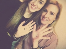 Korie Robertson is one proud mother as daughter Bella works the lights at church