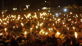 Copenhagen shootings: Danes mourn their dead at torch-lit ceremonies 