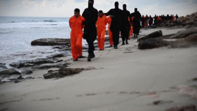 Libya killings: traumatised families gather to mourn their dead 