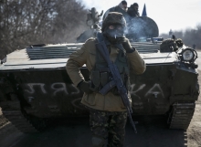 Ukraine claims rebels are attacking villages in spite of ceasefire deal