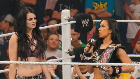 WWE 2015 news: AJ Lee returns on WWE RAW, saves Paige