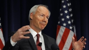 Arkansas governor seeks to fix controversial religion law seen as targeting gay people