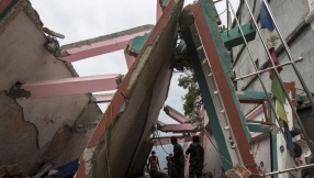 Homeless Nepalis sleep in the open as monsoon rains approach