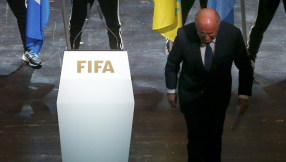 FIFA: Blatter defies calls to step down as corruption scandal widens 
