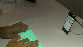 Lenovo Smart Cast is a smartphone projector capable of displaying a virtual keyboard on to any surface