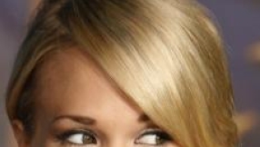 What song made Carrie Underwood cry? Clue: It was sung by her husband Mike