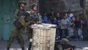 Israeli couple on board car shot dead in front of kids in Palestinian terror attack