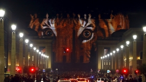 St. Peter\'s Basilica transformed into work of art in light show aimed at raising awareness on climate change