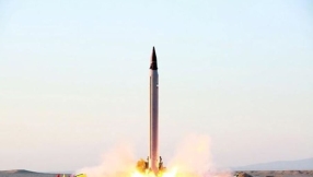 Iran defies U.N. anew, test-fires mid-range ballistic missile that has capability to carry a nuke warhead